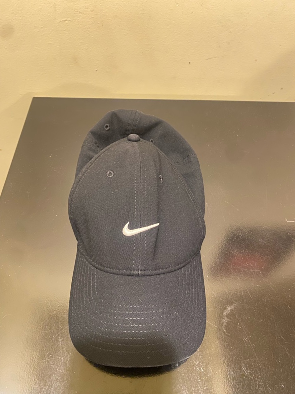 Nike Men’s Black Hat with White Swoosh